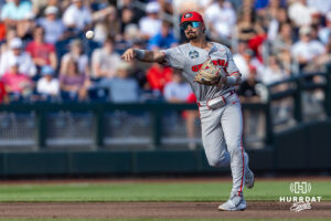 Georgia Bulldog infielder Kolby Branch (9) throws to first base against the Oklahoma Sooners in the first inning during the College World Series baseball tournament on Monday, June 15, 2026, in Omaha, Neb. Photo by John S. Peterson.