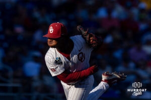 Oklahoma Sooner pitcher Xander Mercurius (23) throws a pitch in the fourth inning against the Georgia Bulldogs during the College World Series baseball tournament on Monday, June 15, 2026, in Omaha, Neb. Photo by John S. Peterson.