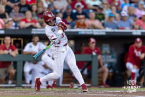Oklahoma Sooner catcher Brendan Brock (10) hits a home run against the Georgia Bulldogs in the fourth inning during the College World Series baseball tournament on Monday, June 15, 2026, in Omaha, Neb. Photo by John S. Peterson.