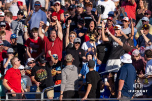 A young CWS fan catches the home run ball from Oklahoma Sooner catcher Brendan Brock (10) in the fourth inning against the Georgia Bulldogs during the College World Series baseball tournament on Monday, June 15, 2026, in Omaha, Neb. Photo by John S. Peterson.