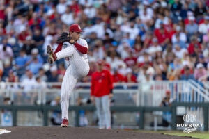 Oklahoma Sooner pitcher Jackson Cleveland (49) throws a pitch in the eighth inning against the Georgia Bulldogs during the College World Series baseball tournament on Monday, June 15, 2026, in Omaha, Neb. Photo by John S. Peterson.