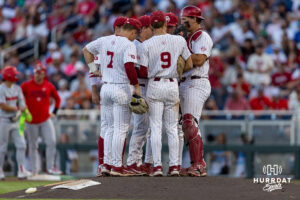 Oklahoma Sooners has a meeting on the mound against the Georgia Bulldogs in the eighth inning during the College World Series baseball tournament on Monday, June 15, 2026, in Omaha, Neb. Photo by John S. Peterson.