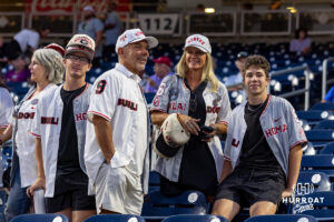 The Branch family wearing special jerseys for the Georgia v Oklahoma game made with both Oklahoma and Georgia jersey for their two sons, one plays for Georgia and the other plays for Oklahoma during the College World Series baseball tournament on Monday, June 15, 2026, in Omaha, Neb. Photo by John S. Peterson.