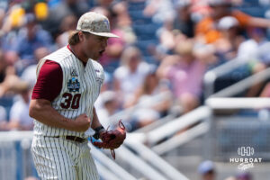 Troy Trojans Cooper Ellingworth (30) celebrates a strike out during a CWS game on June 16, 2026, in Omaha, Nebraska. Photo by Brandon Tiedemann.