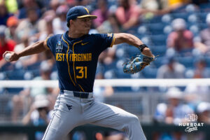 West Virginia Mountaineers Dawson Montesa (31) pitches during a CWS game on June 16, 2026, in Omaha, Nebraska. Photo by Brandon Tiedemann.