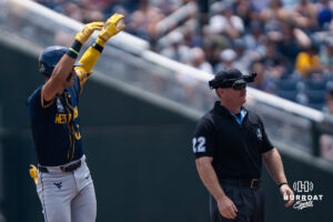 West Virginia Mountaineers Matthew Graveline (0) celebrates a double during a CWS game on June 16, 2026, in Omaha, Nebraska. Photo by Brandon Tiedemann.