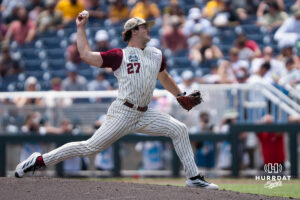 Troy Trojans Dylan Alonso (27) pitches during a CWS game on June 16, 2026, in Omaha, Nebraska. Photo by Brandon Tiedemann.