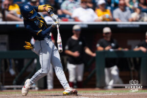 West Virginia Mountaineers Gavin Kelly (2) hits during a CWS game on June 16, 2026, in Omaha, Nebraska. Photo by Brandon Tiedemann.