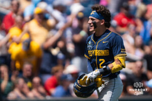 West Virginia Mountaineer Gavin Kelly (2) celebrates a home run during a CWS game on June 16, 2026, in Omaha, Nebraska. Photo by Brandon Tiedemann.