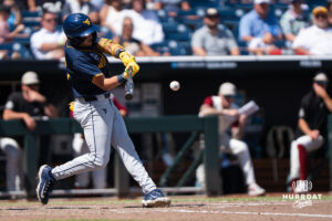 West Virginia Mountaineers Brodie Kresser (12) hits during a CWS game on June 16, 2026, in Omaha, Nebraska. Photo by Brandon Tiedemann.