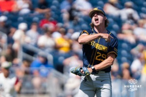 West Virginia Mountaineers Reese Bassinger (29) cheers during a CWS game on June 16, 2026, in Omaha, Nebraska. Photo by Brandon Tiedemann.