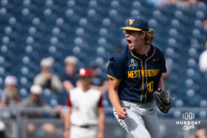 West Virginia Mountaineers Carson Estridge (40) celebrates during a CWS game on June 16, 2026, in Omaha, Nebraska. Photo by Brandon Tiedemann.