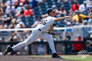 West Virginia Mountaineers Ben McDougal (55) pitches in the thrid inning during a CWS game on June 17, 2026, in Omaha, Nebraska. Photo by Brandon Tiedemann.