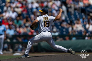 West Virginia Mountaineer pitcher Ian Korn (18) throws a pitch against the North Carolina Tar Heels in third inning during the College World Series baseball tournament on Wednesday, June 17, 2026, in Omaha, Neb. Photo by John S. Peterson.