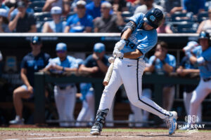 North Carolina Tar Heels Erik Paulsen (44) hits the ball in the third inning during a CWS game on June 17, 2026, in Omaha, Nebraska. Photo by Brandon Tiedemann.