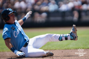 North Carolina Tar Heels Cooper Nicholson (1) slides into third base in the third inning during a CWS game on June 17, 2026, in Omaha, Nebraska. Photo by Brandon Tiedemann.