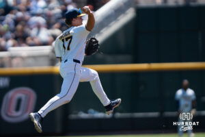 West Virginia Mountaineers Matt Ineich (17) throws to first base in the fourth inning during a CWS game on June 17, 2026, in Omaha, Nebraska. Photo by Brandon Tiedemann.