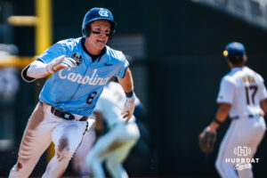 North Carolina Tar Heels Owen Hull (8) rounds second base in the sixth inning during a CWS game on June 17, 2026, in Omaha, Nebraska. Photo by Brandon Tiedemann.