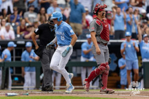 North Carolina Tar Heel infielder Owen Hull (8) scores a run against the Oklahoma Sooners in the first inning during the Finals of the College World Series baseball tournament on Saturday, June 20, 2026, in Omaha, Neb. Photo by John S. Peterson.