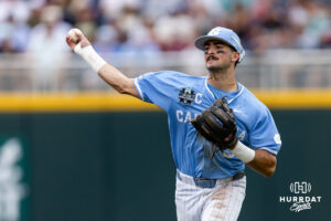 North Carolina Tar Heel infielder Gavin Gallaher (5) throws to first against Oklahoma Sooner Trey Gambill (20) in the fourth inning during the Finals of the College World Series baseball tournament on Saturday, June 20, 2026, in Omaha, Neb. Photo by John S. Peterson.