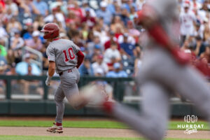 Oklahoma Sooner catcher Brendan Brock (10) runs to third from a Dasan Harris double in the fourth inning against the North Carolina Tar Heels during the Finals of the College World Series baseball tournament on Saturday, June 20, 2026, in Omaha, Neb. Photo by John S. Peterson.
