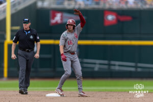 Oklahoma Sooner infielder Dayton Tockey (16) celebrates hitting a double in the sixth inning against the North Carolina Tar Heels during the Finals of the College World Series baseball tournament on Saturday, June 20, 2026, in Omaha, Neb. Photo by John S. Peterson.