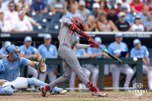 Oklahoma Sooner Dasan Harris (17) hits a single in the eighth inning against the North Carolina Tar Heels during the Finals of the College World Series baseball tournament on Saturday, June 20, 2026, in Omaha, Neb. Photo by John S. Peterson.