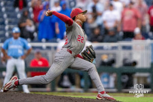 Oklahoma Sooners LJ Mercurius (22) pitches during the ninth inning of a CWS game on June 20, 2026, in Omaha, Nebraska. Photo by Brandon Tiedemann.