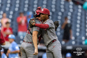 Oklahoma Sooners catcher Deiten Lachance (48) and pitcher Lj Mercurius (22) hug after the win against the North Carolina Tar Heels during the Finals of the College World Series baseball tournament on Saturday, June 20, 2026, in Omaha, Neb. Photo by John S. Peterson.