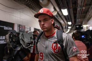 Oklahoma Sooner pitcher Cord Rager (99) heads to the bus after the win against the North Carolina Tar Heels during the Finals of the College World Series baseball tournament on Saturday, June 20, 2026, in Omaha, Neb. Photo by John S. Peterson.