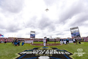 A Looking Glass plane does a flyover before the game between Oklahoma Sooners and North Carolina Tar Heels during game two of the Finals of the College World Series baseball tournament on Sunday, June 21, 2026, in Omaha, Neb. Photo by John S. Peterson.