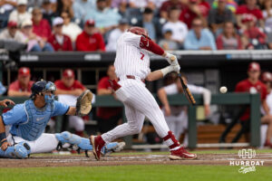 Oklahoma Sooner Jaxon Willits (7) hits a one-run double in the first inning against the North Carolina Tar Heels during game two of the Finals of the College World Series baseball tournament on Sunday, June 21, 2026, in Omaha, Neb. Photo by John S. Peterson.