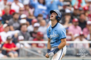 North Carolina Tar Heel infielder Jake Schaffner (2) celebrates his run in the third against the Oklahoma Sooners during game two of the Finals of the College World Series baseball tournament on Sunday, June 21, 2026, in Omaha, Neb. Photo by John S. Peterson.