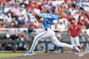 North Carolina Tar Heel pitcher Caden Glauber (27) throws a pitch in the fifth inning against the Oklahoma Sooners during game two of the Finals of the College World Series baseball tournament on Sunday, June 21, 2026, in Omaha, Neb. Photo by John S. Peterson.