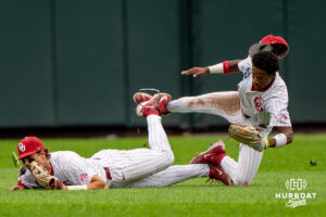 Oklahoma Sooners Brendan Brock (10) and Jason Walk (1) collide during the sixth inning of a CWS game on June 21, 2026, in Omaha, Nebraska. Photo by Brandon Tiedemann.