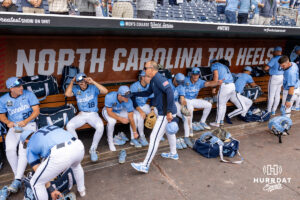 North Carolina Tar Heel head coach Scott Forbes congratulates his players after the win over the North Carolina Tar Heels during game two of the Finals of the College World Series baseball tournament on Sunday, June 21, 2026, in Omaha, Neb. Photo by John S. Peterson.