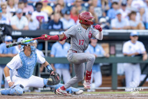 Oklahoma Sooner Dasan Harris (17) hits a single in the second inning against the North Carolina Tar Heels during game three of the Finals of the College World Series baseball tournament on Monday, June 22, 2026, in Omaha, Neb. Photo by John S. Peterson.