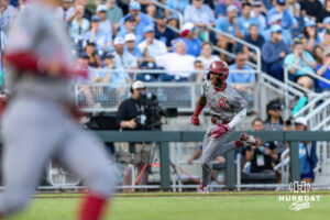Oklahoma Sooner outfielder Dasan Harris (17) runs home as Oklahoma Sooner infielder Kyle Branch (6) runs to first in the second inning during game three of the Finals of the College World Series baseball tournament on Monday, June 22, 2026, in Omaha, Neb. Photo by John S. Peterson.