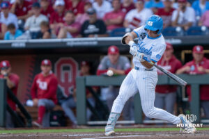 North Carolina Tar Heels Jake Schaffner (2) hits the ball during the third inning of a CWS game on June 22, 2026, in Omaha, Nebraska. Photo by Brandon Tiedemann.