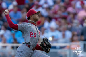 Oklahoma Sooners LJ Mercurius (22) pitches during the third inning of a CWS game on June 22, 2026, in Omaha, Nebraska. Photo by Brandon Tiedemann.