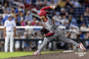 Oklahoma Sooner pitcher Jackson Cleveland (49) throws a pitch against the North Carolina Tar Heels in the ninth inning during game three of the Finals of the College World Series baseball tournament on Monday, June 22, 2026, in Omaha, Neb. Photo by John S. Peterson.