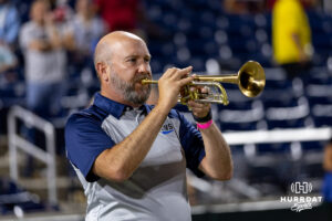 Brian Corey plays "Take Me Out to the Ballpark" to close the games during game three of the Finals of the College World Series baseball tournament on Monday, June 22, 2026, in Omaha, Neb. Photo by John S. Peterson.