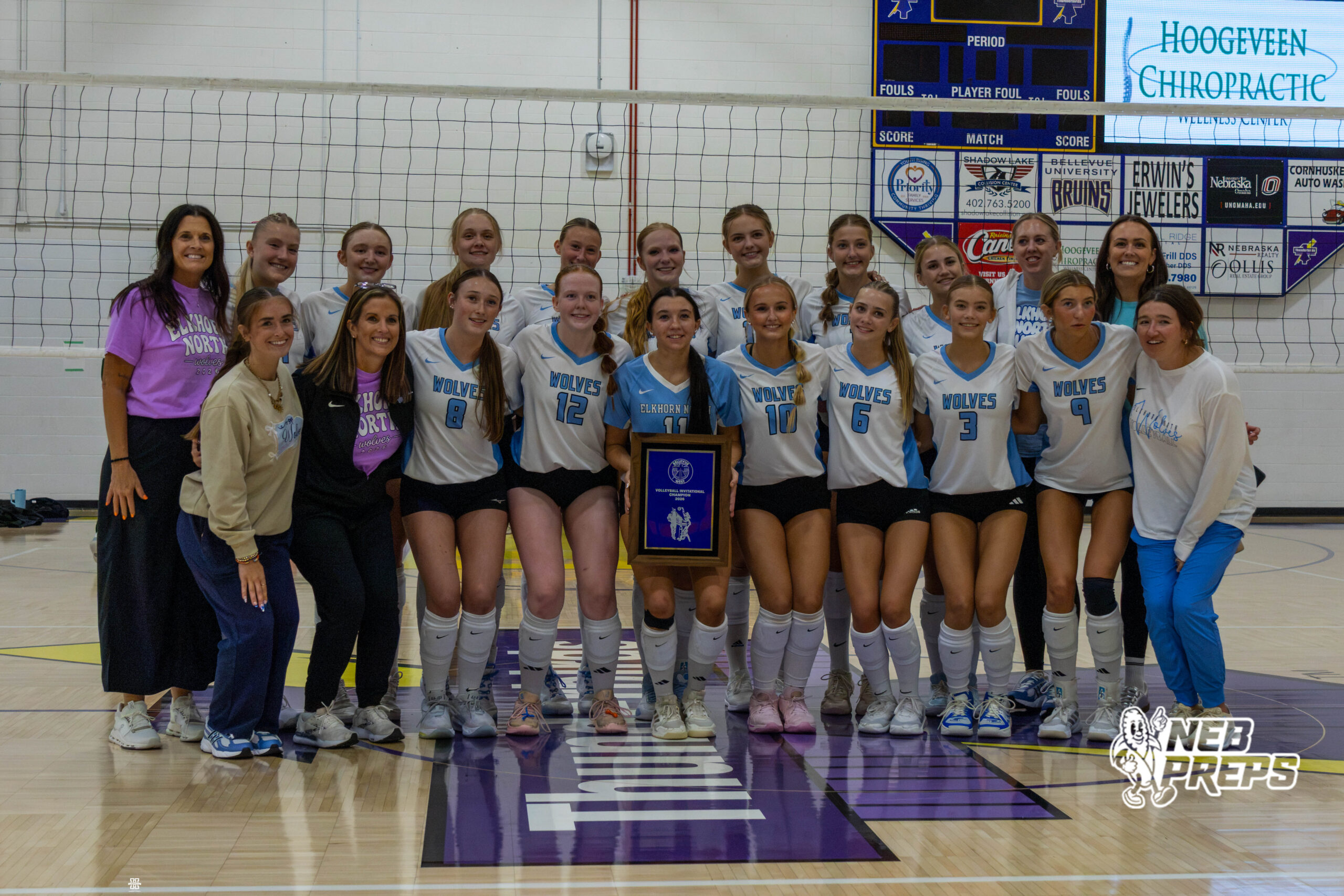 Elkhorn North volleyball poses with the plaque after winning the Bellevue West Thunderbird Throwdown. Photo by Jandi Green.