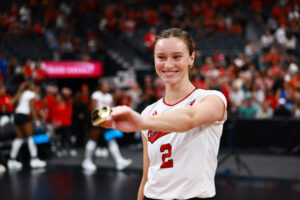 Nebraska senior Bergen Reilly shows off her ring after winning MVP of the Players Era Showcase in Las Vegas. Photo by Sean Jorgensen.