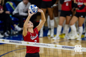 South Dakota native Bergen Reilly sets the ball for No. 1 Nebraska volleyball against South Dakota State in Brookings. Photo by John S. Peterson.