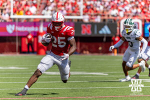 Freshman Jamal Rule runs the ball up the field against Ohio in Nebraska football's season opener. Photo by John S. Peterson.