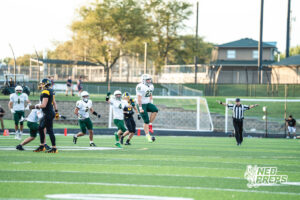 Cayson Schlotfeld (22) jumps in excitement after a 3rd down stop during a high school football game Friday, September 11, 2026, in Gretna, Nebraska. Photo by Robert Olvera