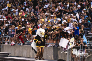 Gretna East Mascot interacts with the fans during a high school football game between the Griffins and Dragons Friday, September 11, 2026, in Gretna, Nebraska. Photo by Robert Olvera