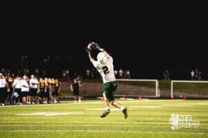 Talon Daharsh (2) catches his second touchdown of the night, the dagger during a high school football game between the Griffins and Dragons Friday, September 11, 2026, in Gretna, Nebraska. Photo by Robert Olvera