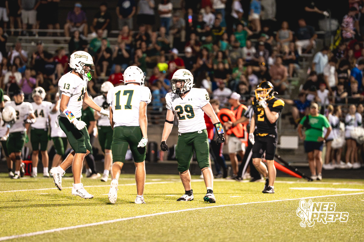 Liam Thompsen (29) celebrates after a tackle on kickoff during a high school football game between the Griffins and Dragons Friday, September 11, 2026, in Gretna, Nebraska. Photo by Robert Olvera